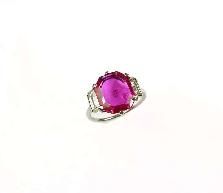 Single stone ruby and diamond ring, set with an octagonal cut Burma ruby